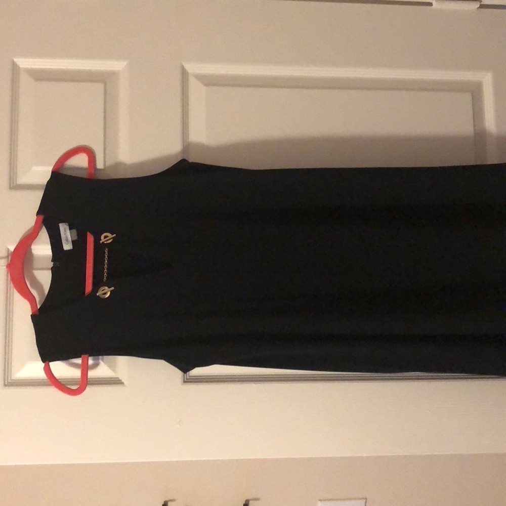 Black mid Calvin Klein w/gold buckle